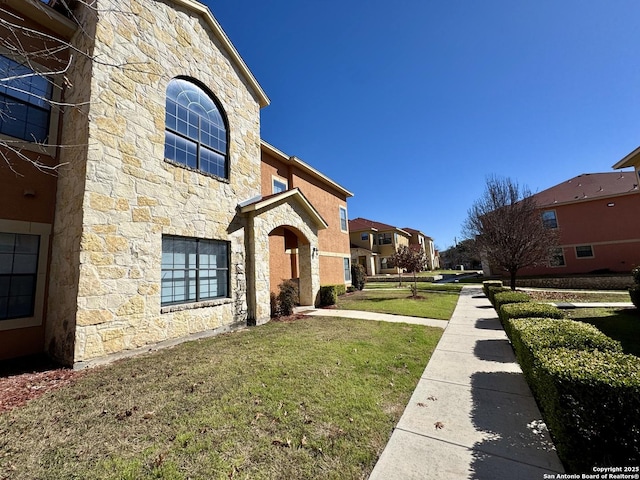 exterior space with a yard