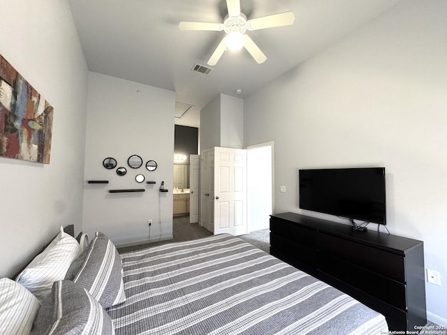 bedroom with high vaulted ceiling, ensuite bathroom, ceiling fan, and carpet flooring