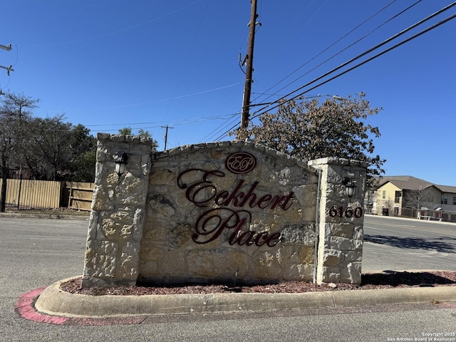 view of community sign