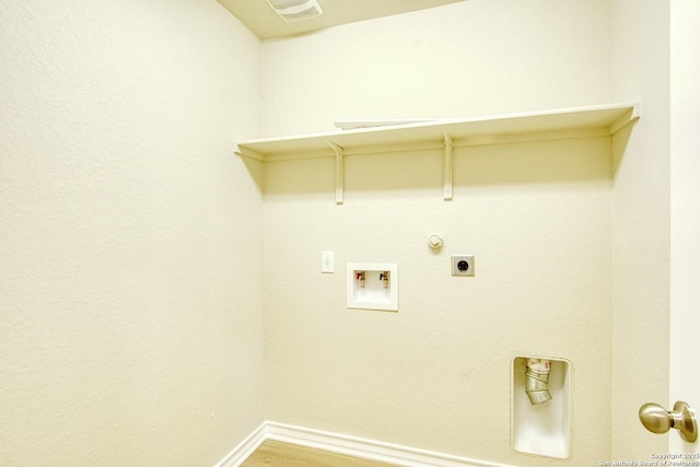 laundry room featuring gas dryer hookup, washer hookup, hookup for an electric dryer, and hardwood / wood-style floors