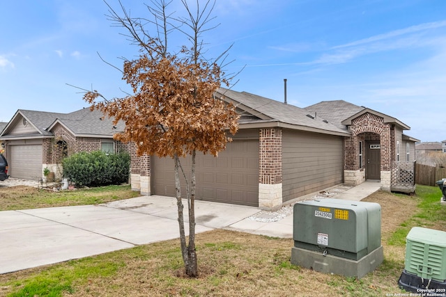 view of front of property with a garage and a front yard