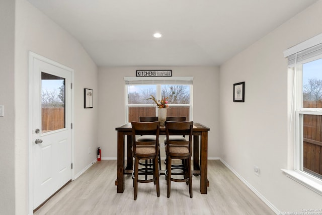 dining space featuring light hardwood / wood-style floors