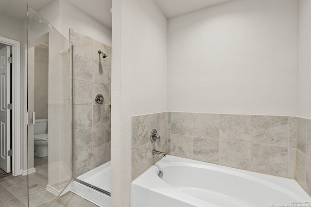 bathroom with independent shower and bath and toilet