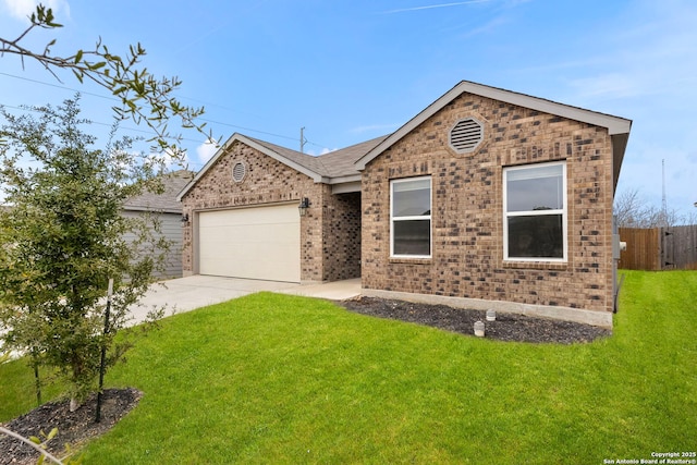 view of front of home featuring a garage and a front lawn