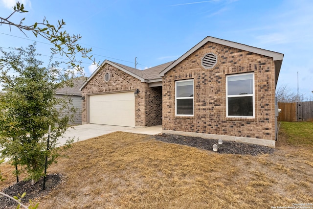 view of front of home with a garage and a front yard