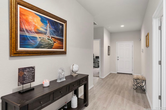 hall featuring light hardwood / wood-style floors