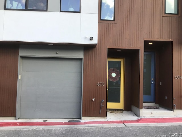 property entrance featuring a garage