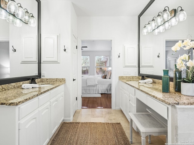 bathroom with vanity and tile patterned flooring