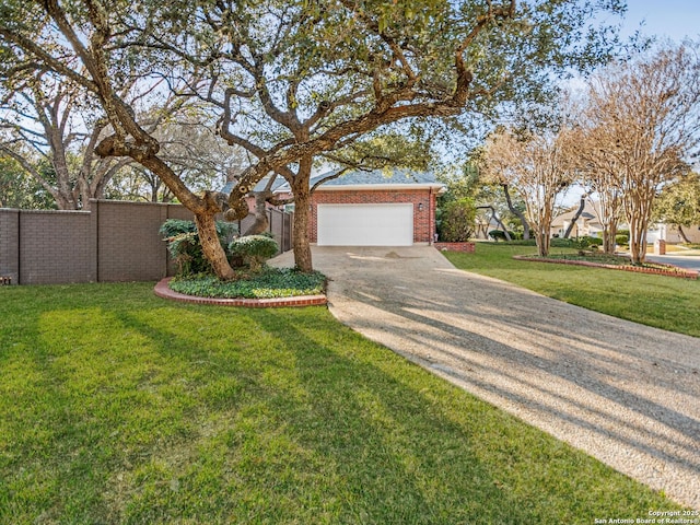 ranch-style house with a garage and a front yard