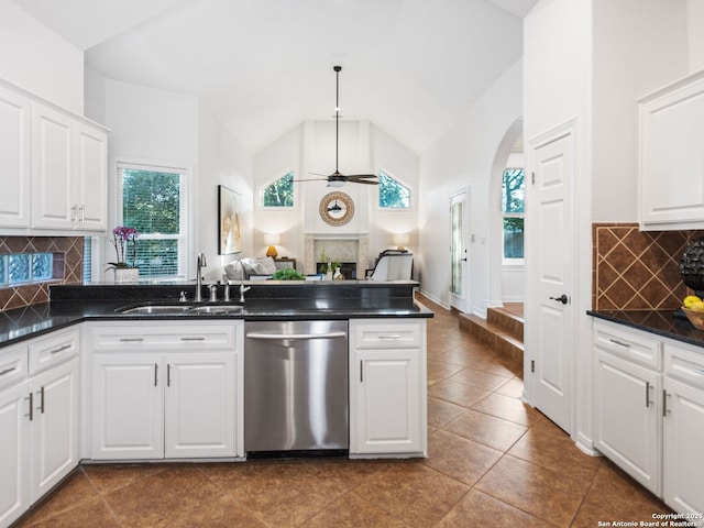 kitchen featuring white cabinetry, sink, and dishwasher