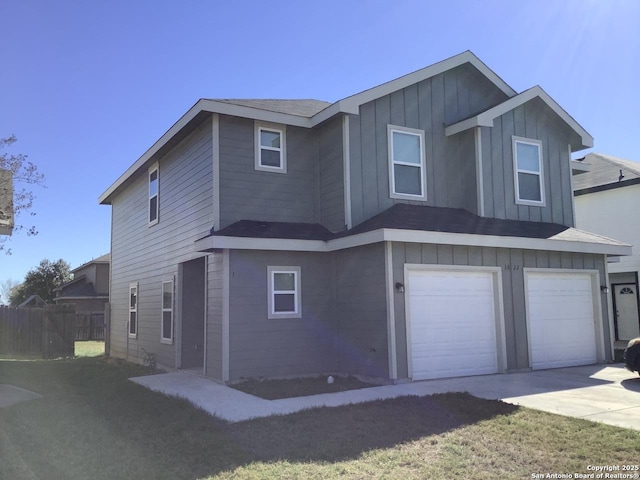 front of property with a garage