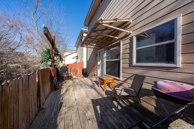 wooden deck with area for grilling