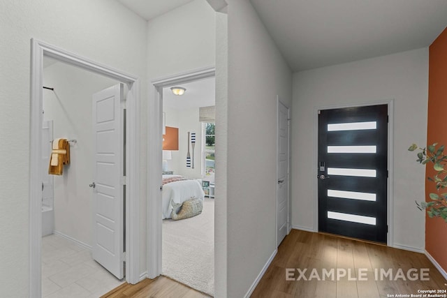 entrance foyer featuring light hardwood / wood-style flooring