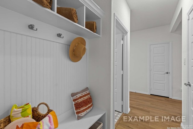 mudroom with light hardwood / wood-style floors