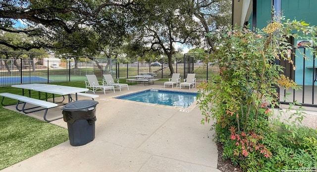 view of pool featuring a patio area