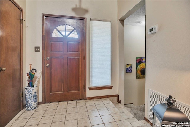 view of tiled entrance foyer