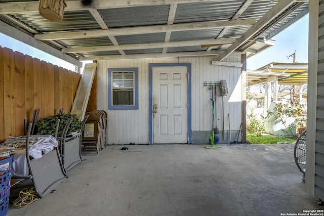 property entrance with a patio area