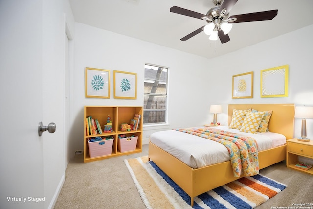 bedroom featuring ceiling fan and carpet flooring