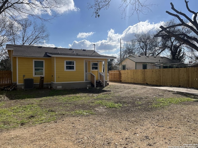 back of property with cooling unit