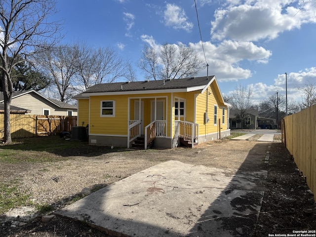 back of property with central air condition unit