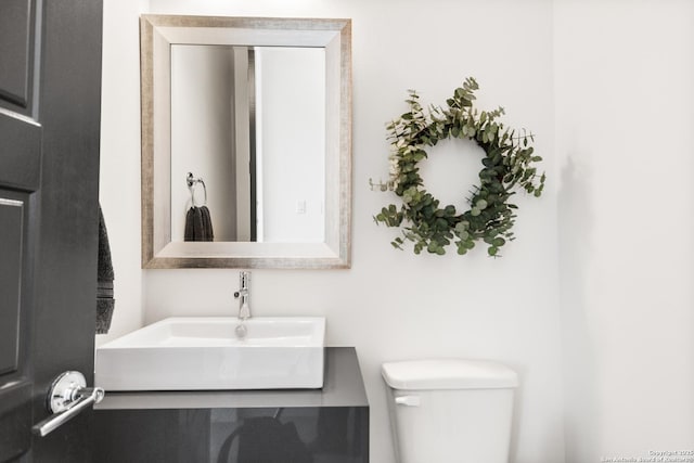 bathroom featuring a sink and toilet