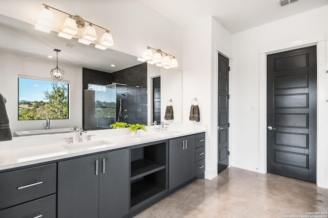 full bath featuring concrete floors, a sink, a shower stall, and double vanity