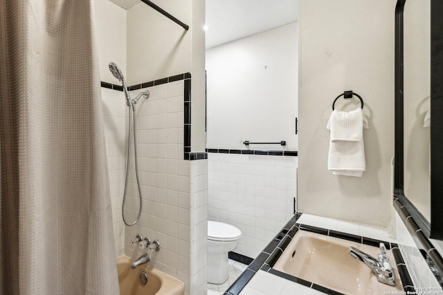 bathroom with tile walls, shower / bath combo, tile patterned floors, and toilet