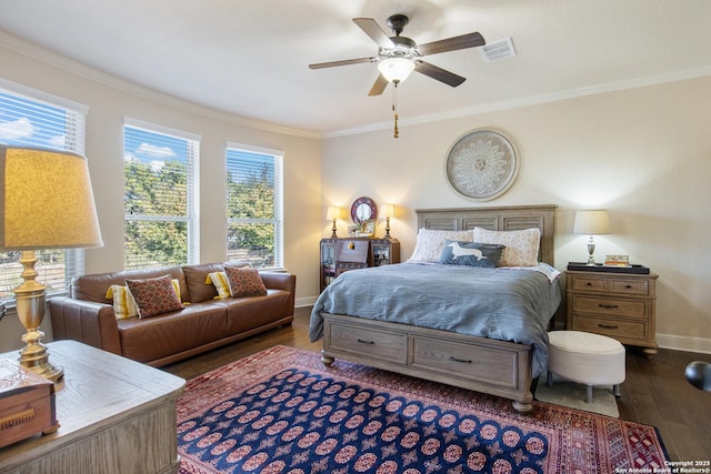 bedroom with ceiling fan, ornamental molding, and dark hardwood / wood-style floors