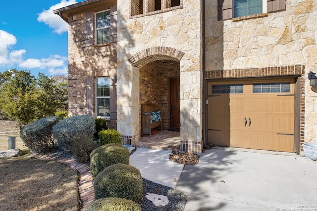 property entrance with a garage