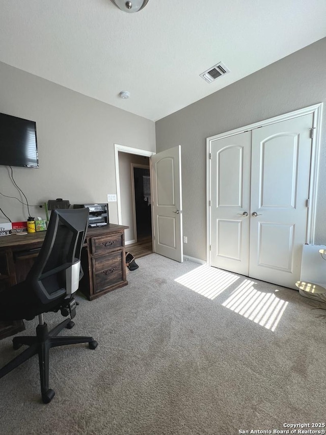 view of carpeted home office