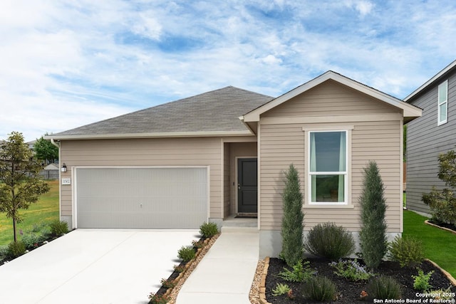 ranch-style home featuring a garage