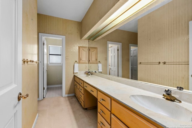 311 Ridge Blf, San Antonio, TX 78216 - full bathroom with double vanity, wallpapered walls, and baseboards