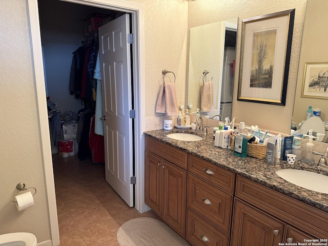 bathroom featuring vanity and tile patterned floors