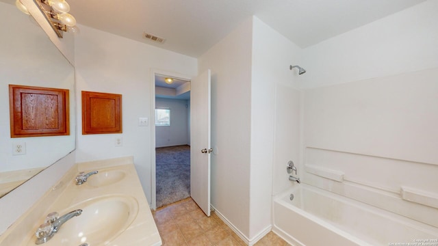 bathroom featuring vanity and bathtub / shower combination