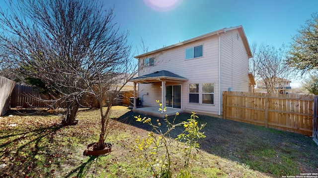 view of front of home featuring central AC unit and a patio area