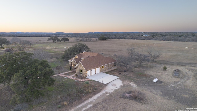 aerial view at dusk with a rural view