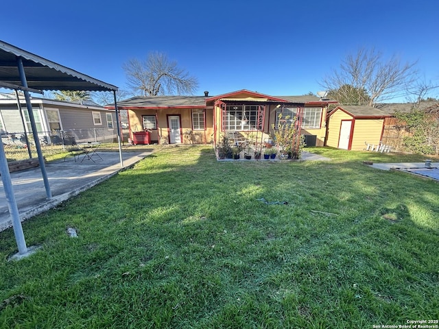 exterior space featuring a storage shed and a front lawn