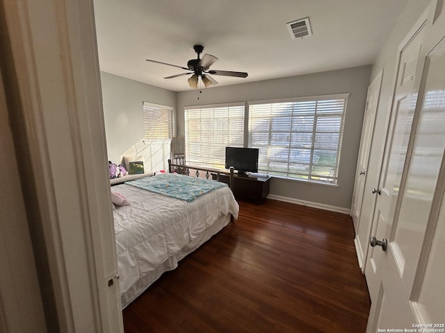 bedroom featuring dark wood-type flooring and ceiling fan