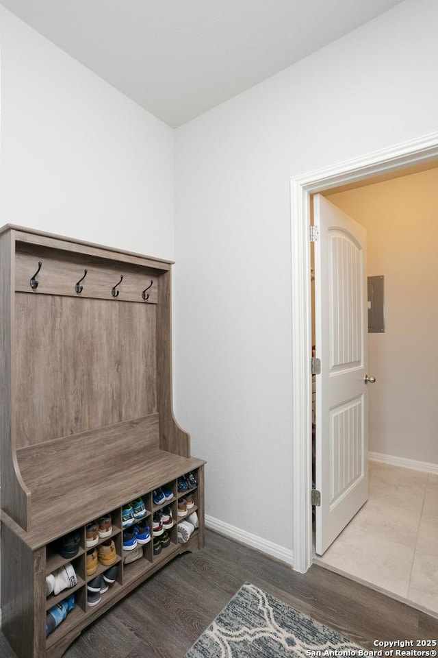 mudroom featuring hardwood / wood-style floors and electric panel