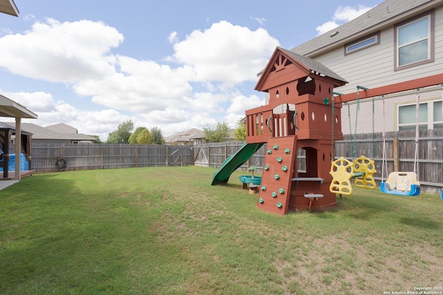 view of jungle gym with a yard