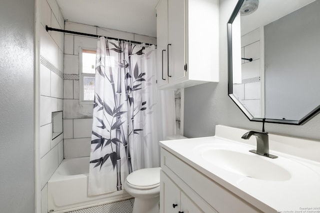 full bathroom featuring shower / bath combo, vanity, and toilet