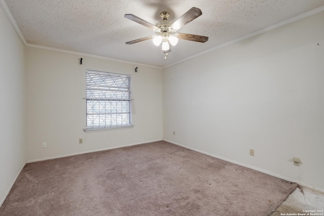 carpeted spare room featuring ornamental molding, ceiling fan, and a textured ceiling