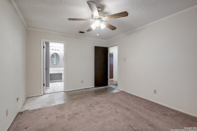 carpeted empty room with ceiling fan, crown molding, and a textured ceiling