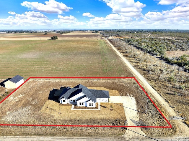 birds eye view of property featuring a rural view