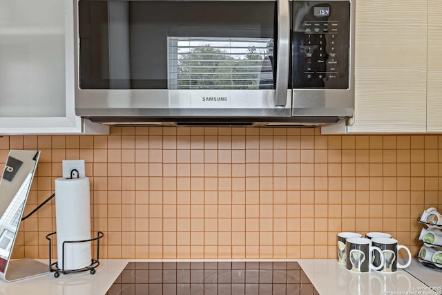 kitchen featuring tile walls