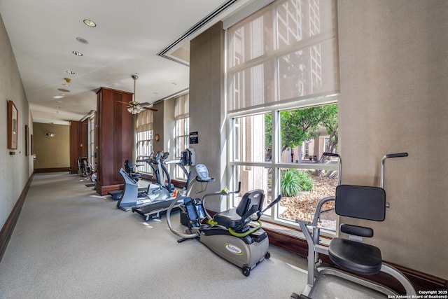 gym with a towering ceiling