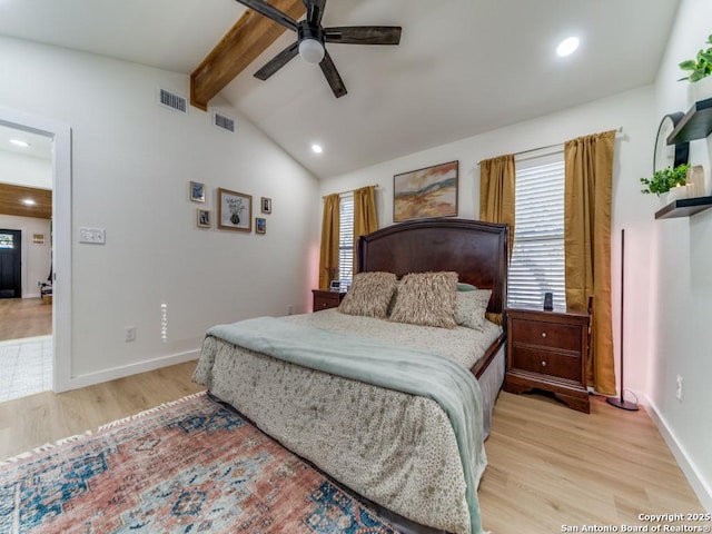 bedroom featuring lofted ceiling with beams, ceiling fan, and light wood-type flooring