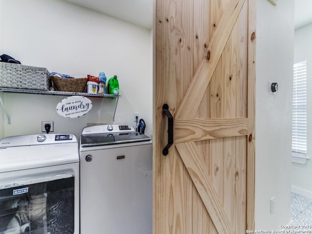 laundry room with washer and clothes dryer