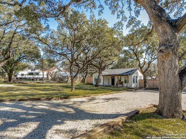 ranch-style house with a front yard