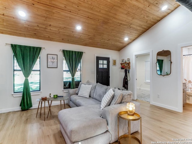 living room with vaulted ceiling, wooden ceiling, and light wood-type flooring